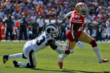 Tevan Coleman evades a tackle for the San Francisco 49ers